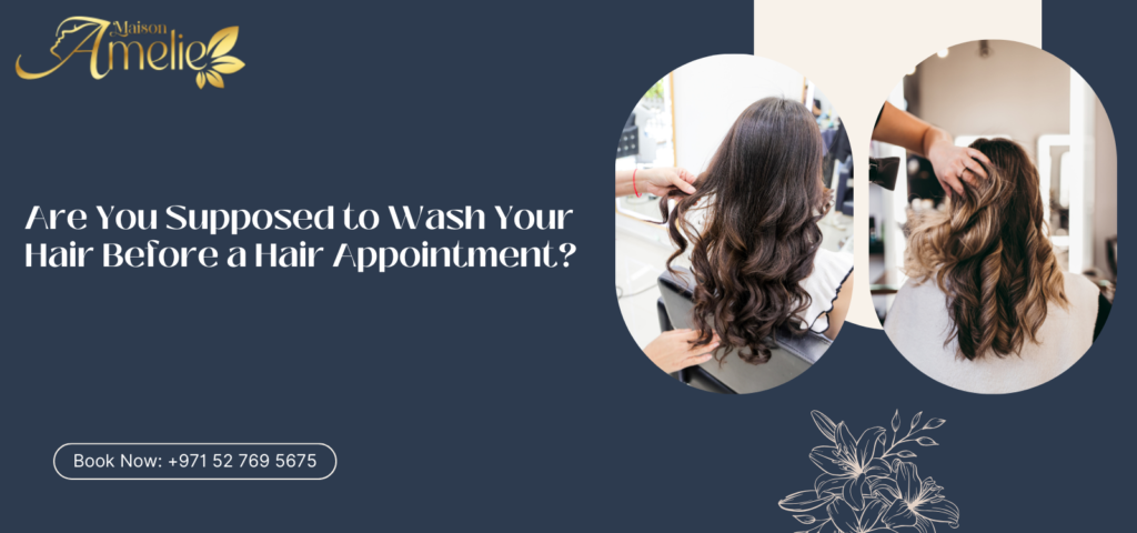 Client consulting a stylist at a ladies beauty salon in Motor City Dubai before a hair treatment